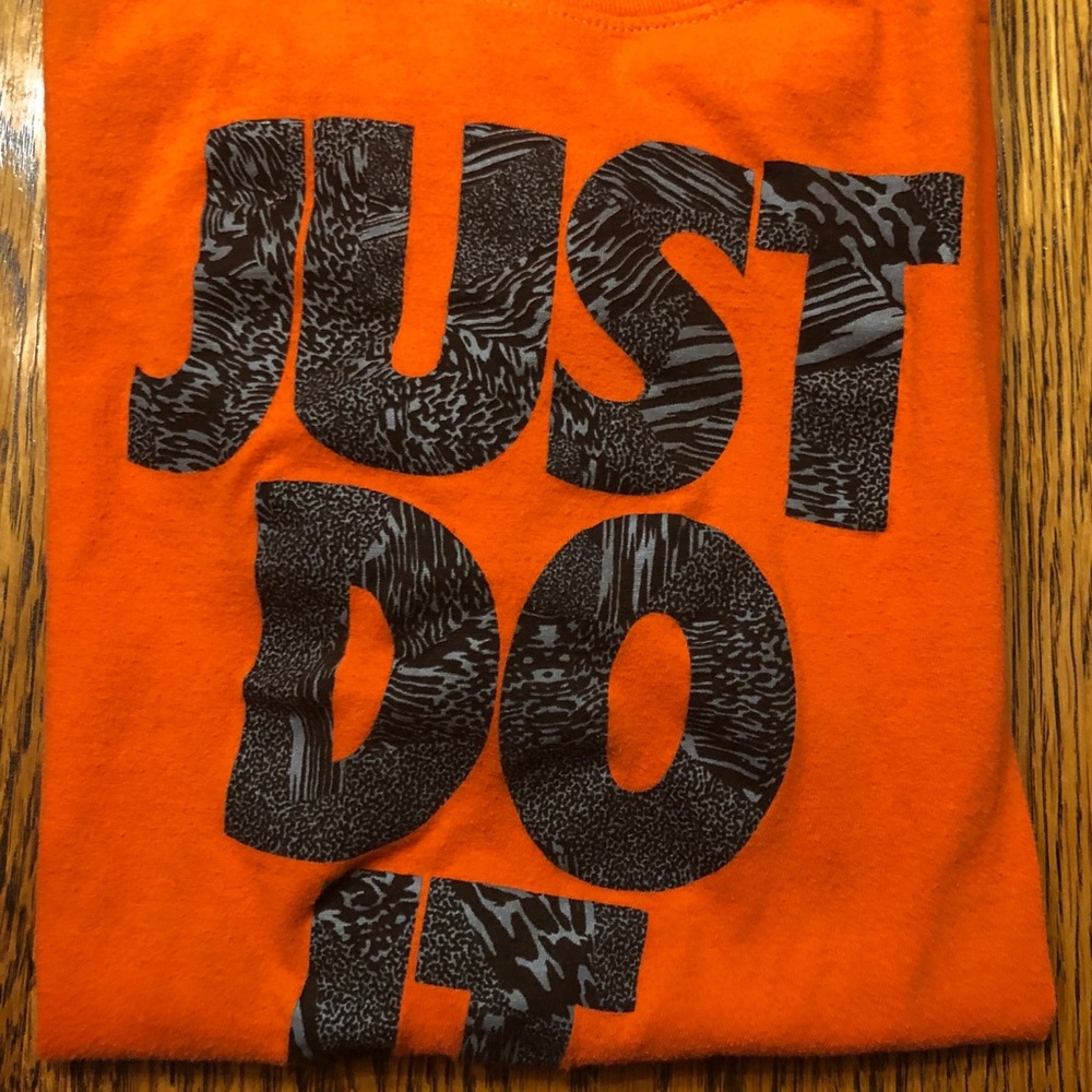 Two short sleeve Nike tee shirts.